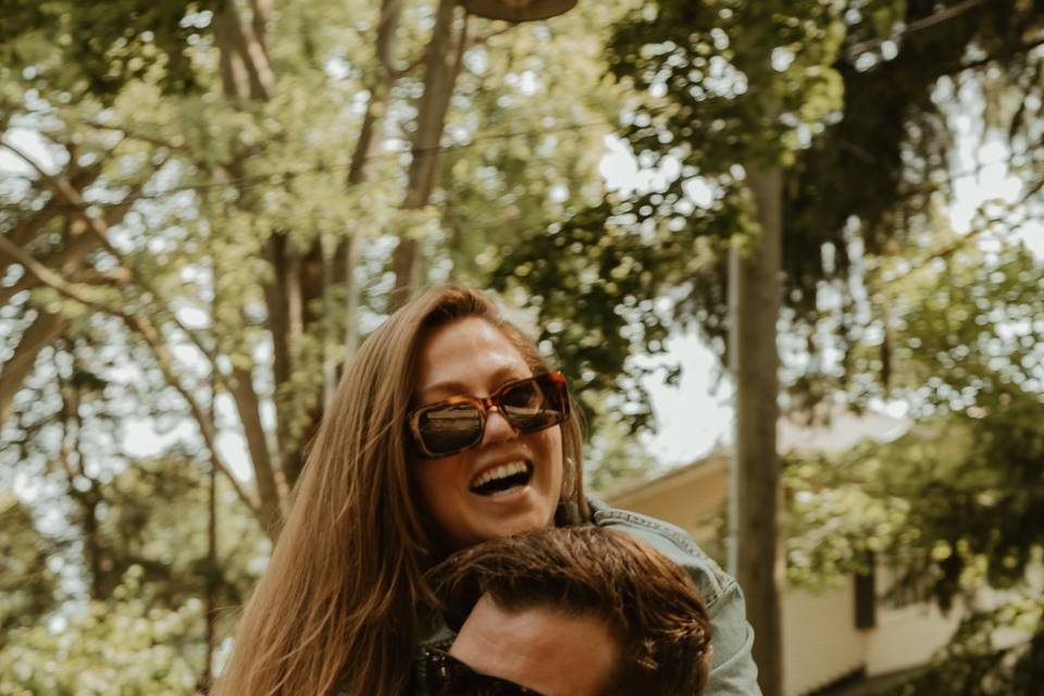 Piggy back engagement shot