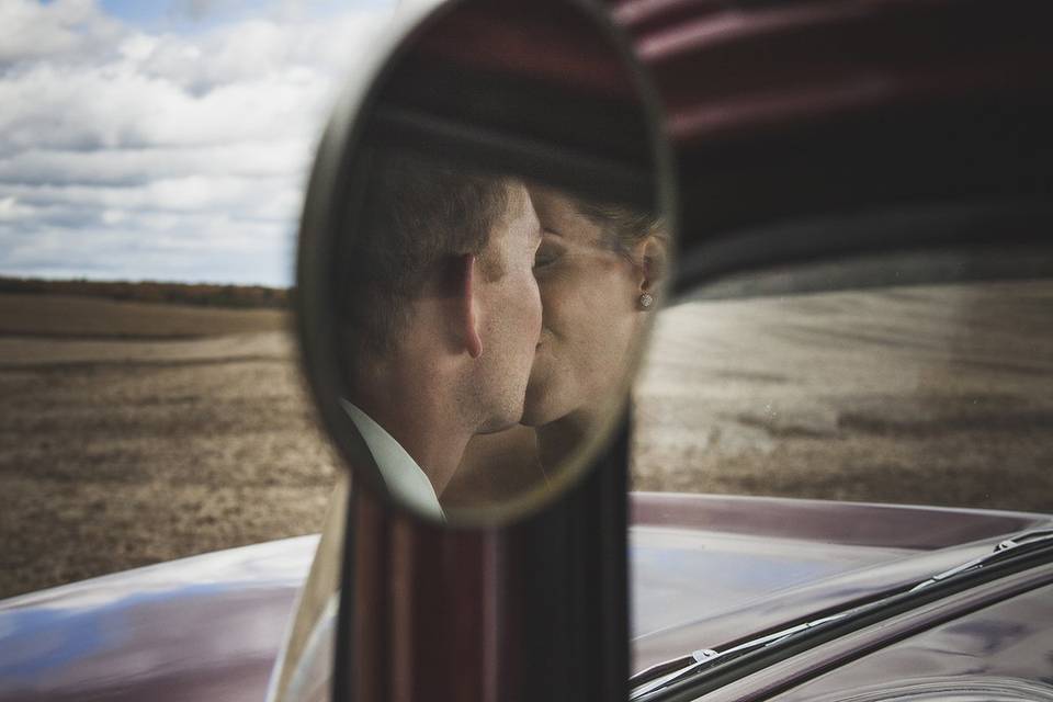 Couple kiss mirror