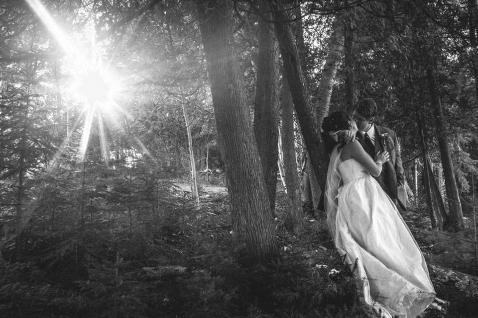 Forest sun kiss bride groom