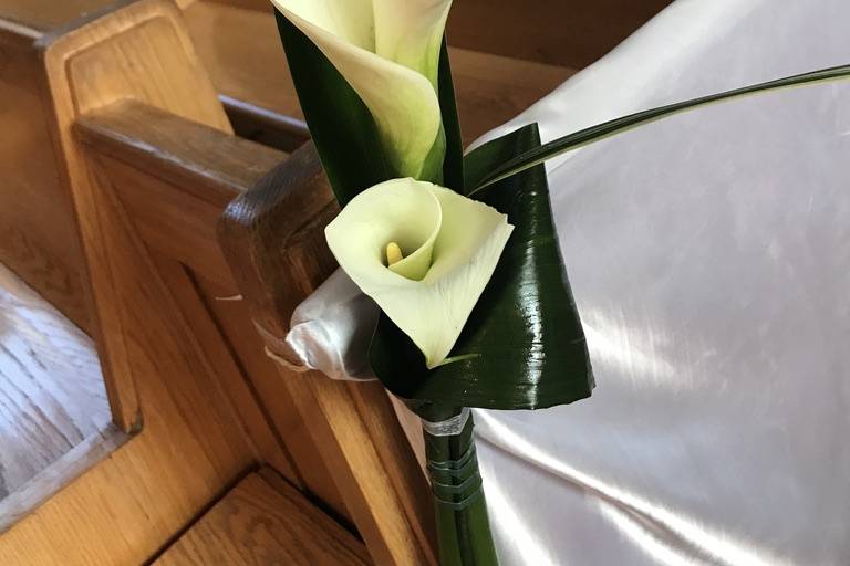 Calla on Pews