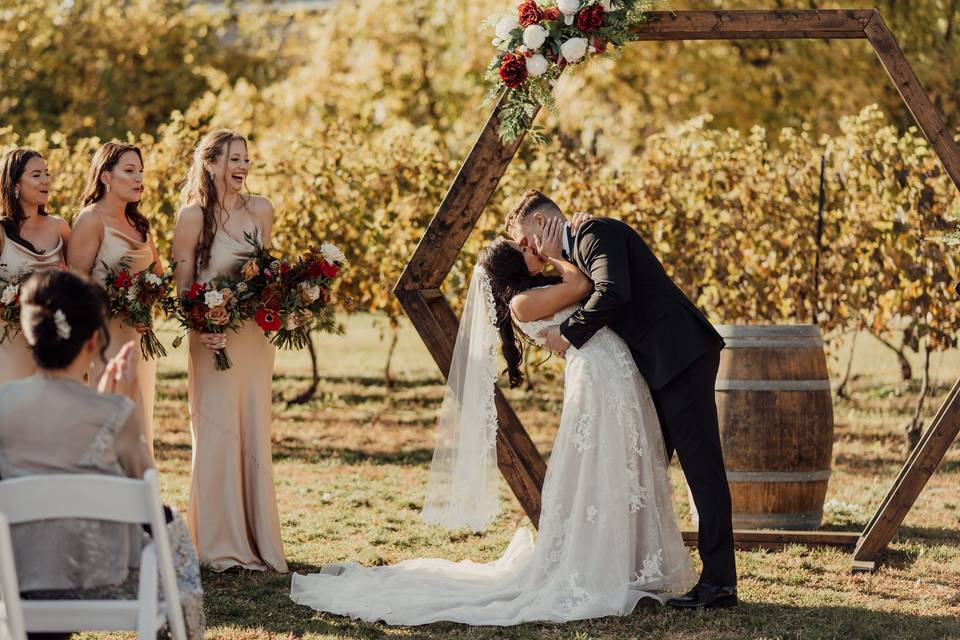 Romantic kiss at ceremony - Erica Fiorido Photography