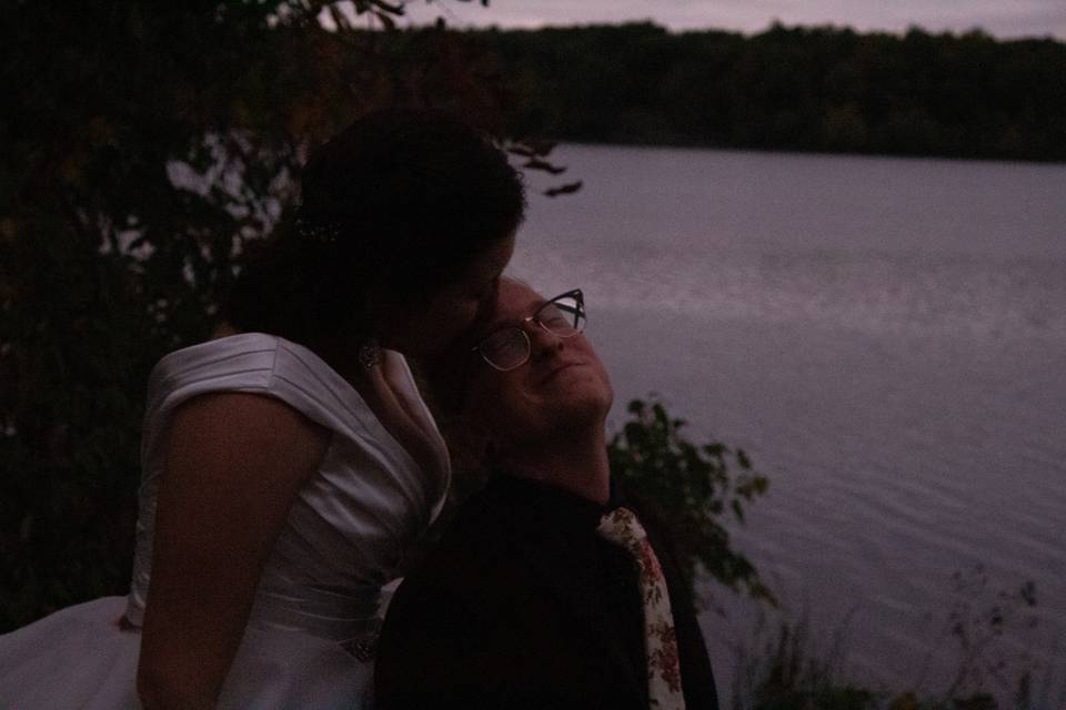 Wedding evening beach kiss.