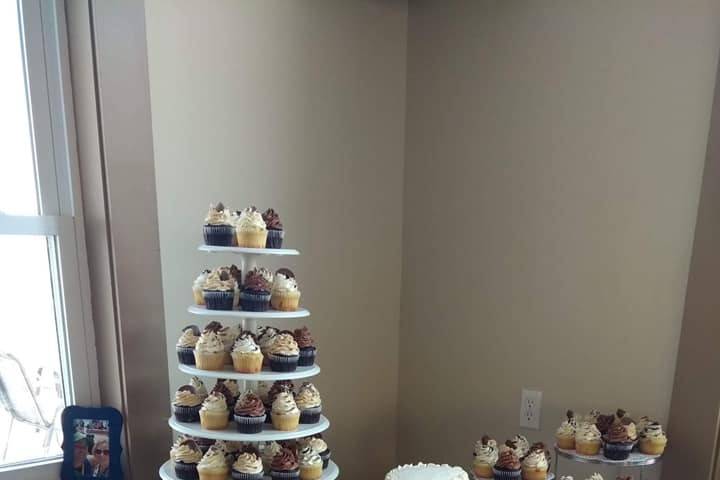 Wedding cake and cupcakes