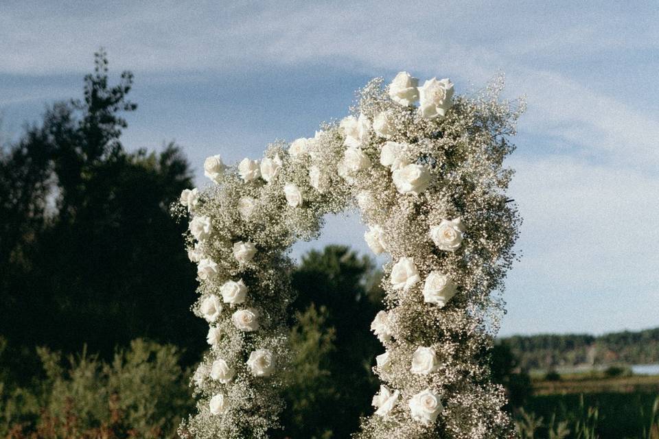 White flower arch
