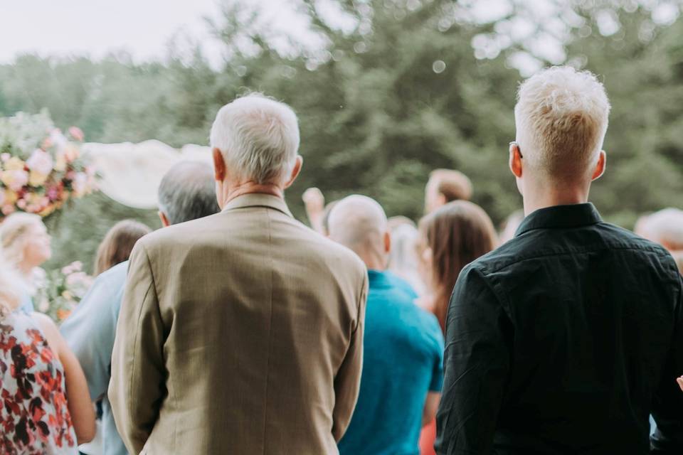 Officiant welcomes guests