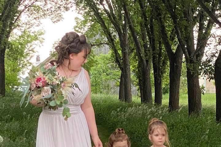 Bridesmaid with flowergirls