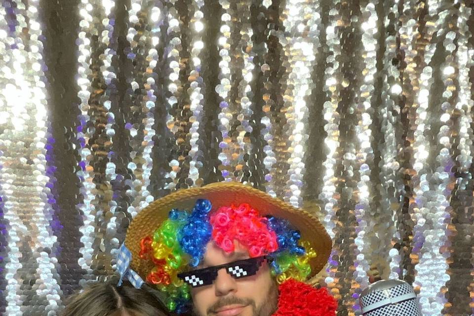 Couple having fun photo booth