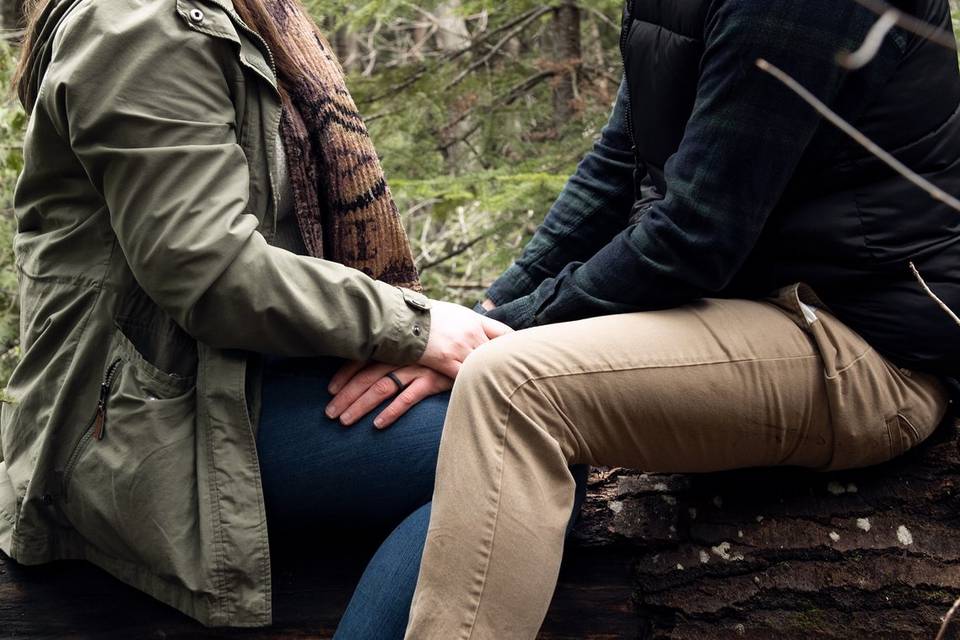 Holding hands on tree branch