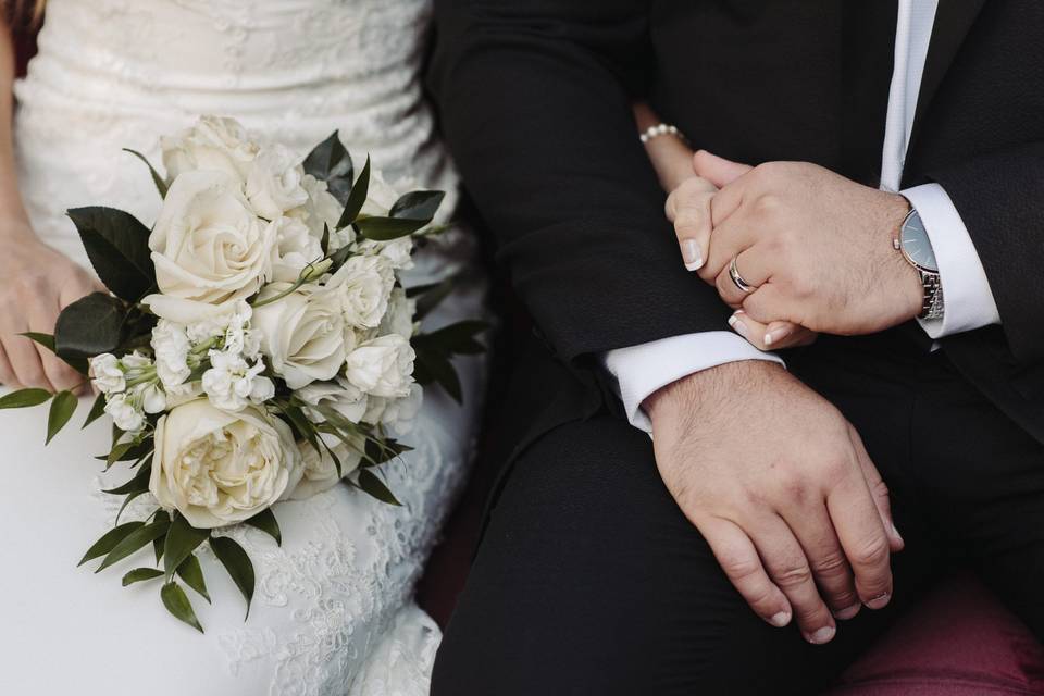 Bride and Groom Holding Hands