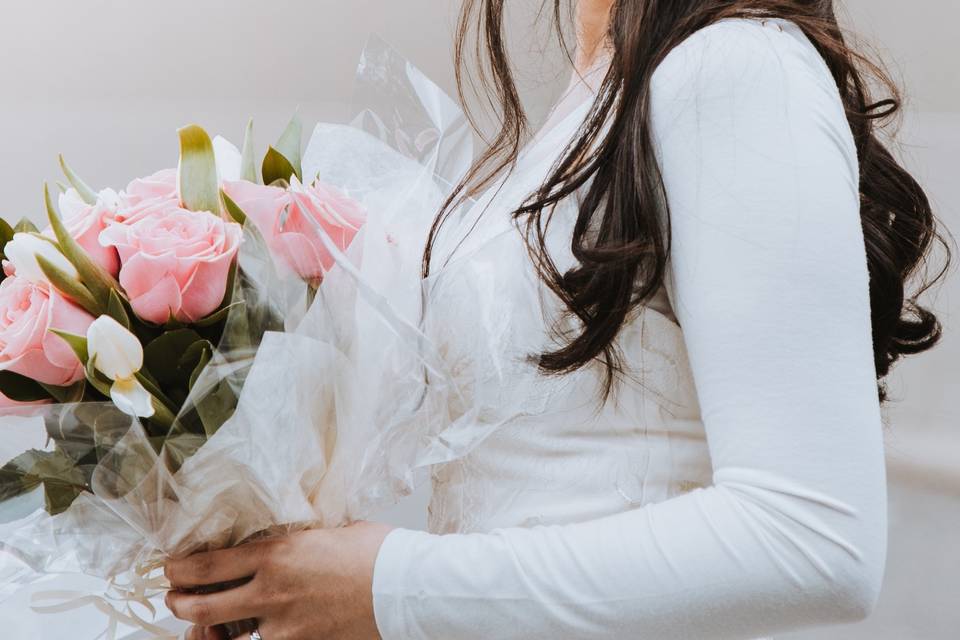 Smiling with her bouquet