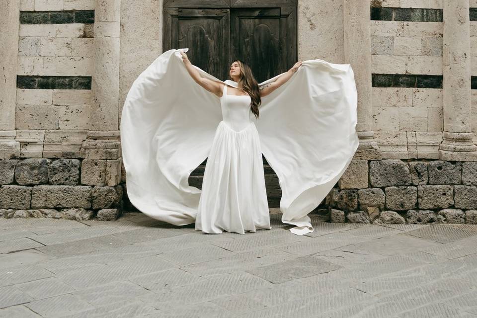 Bride with large cape veil