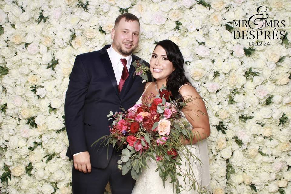 Newly Weds with Flower Wall