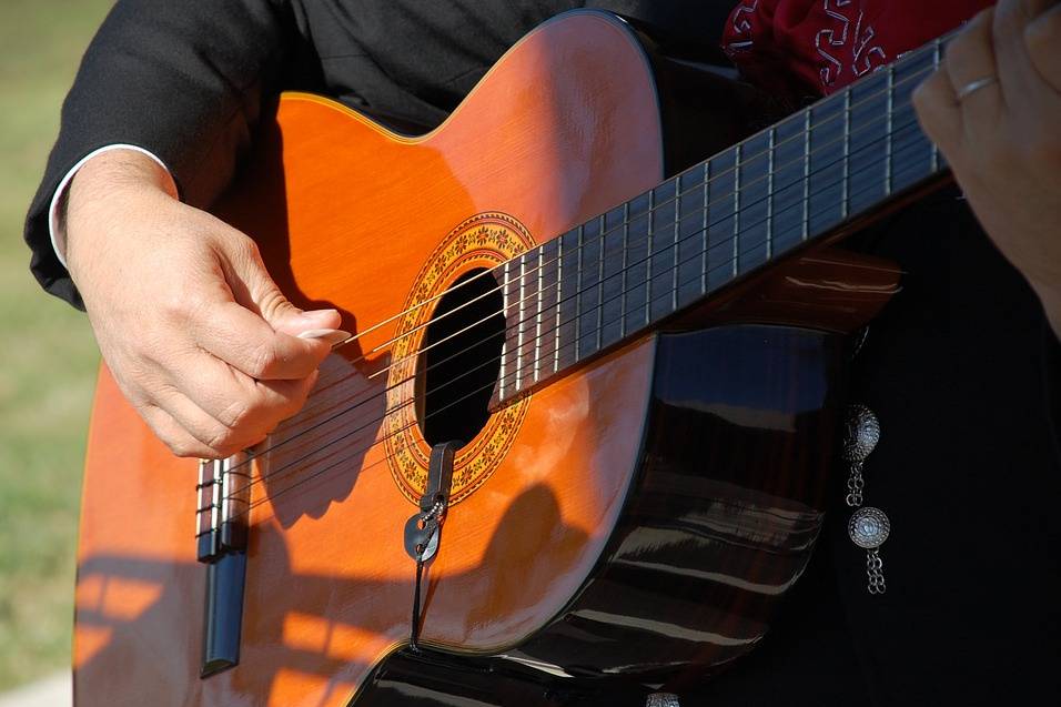 Strumming the guitar