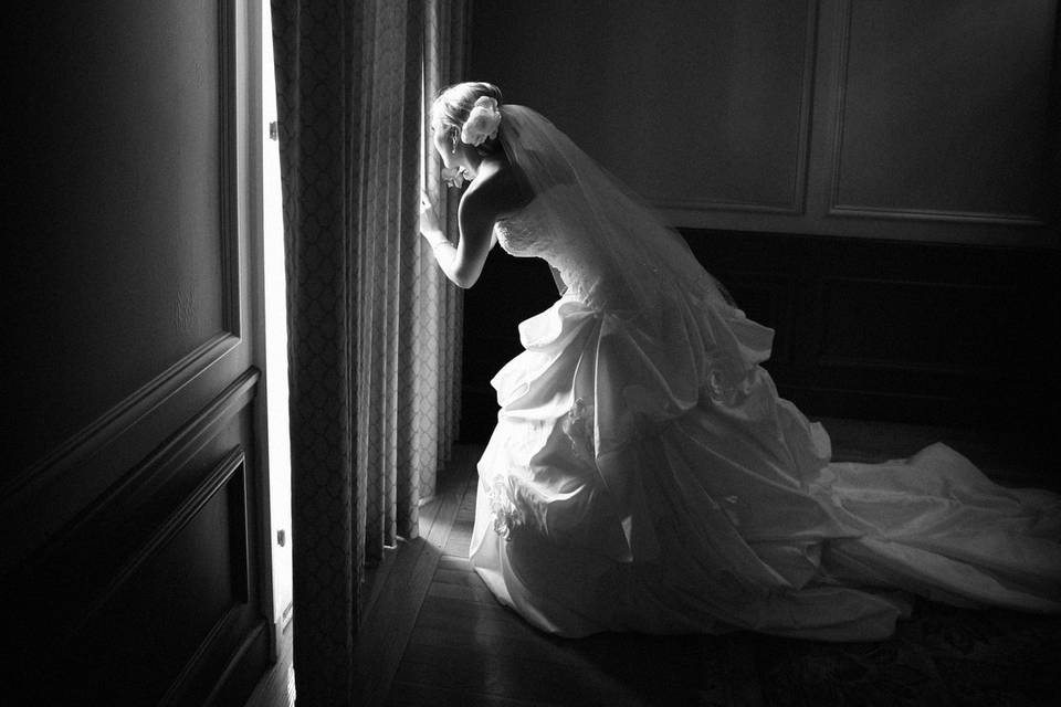 Bride peeking out at guests