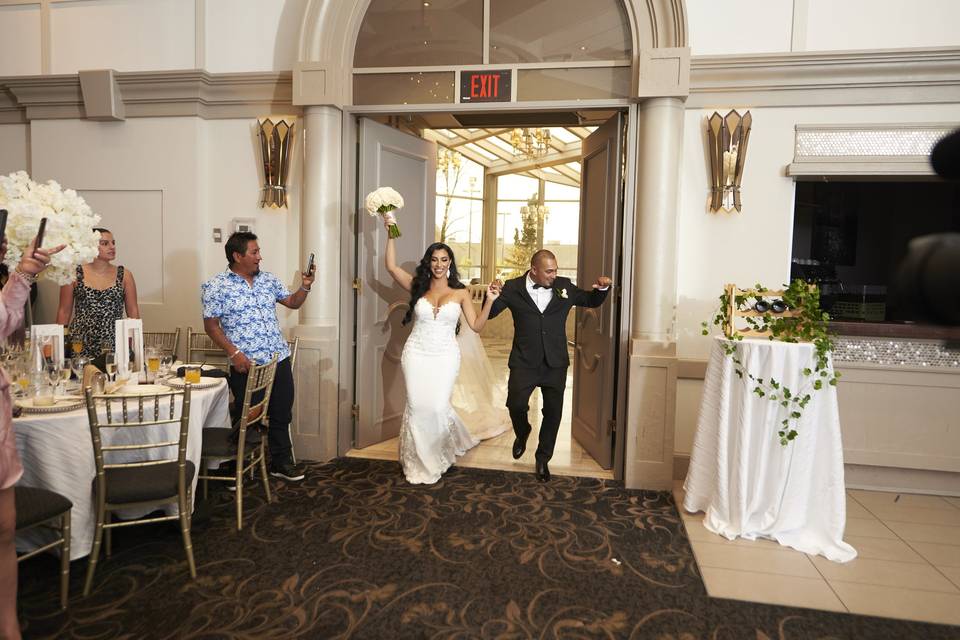 Bride and groom coming in