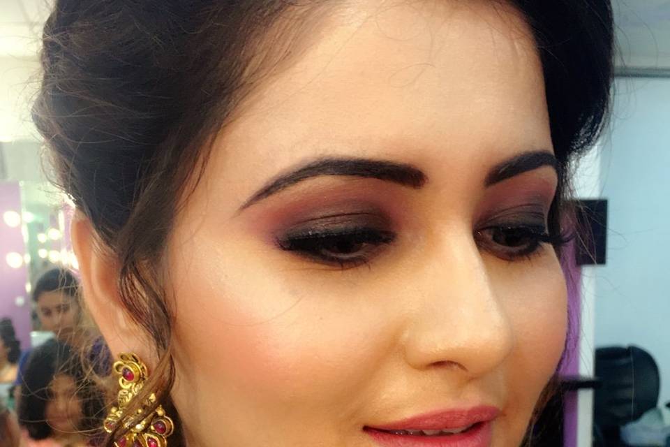 Happy client with eye makeup