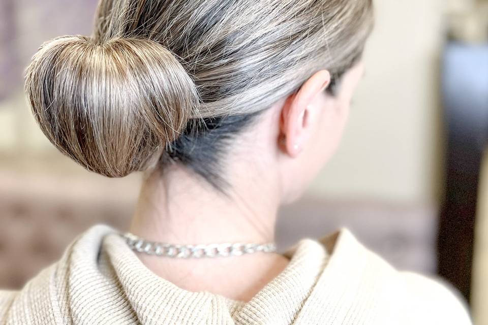 Sleek bun on short hair