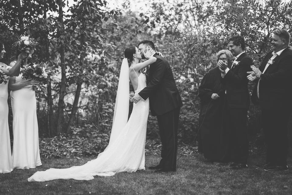 Bride and groom kiss