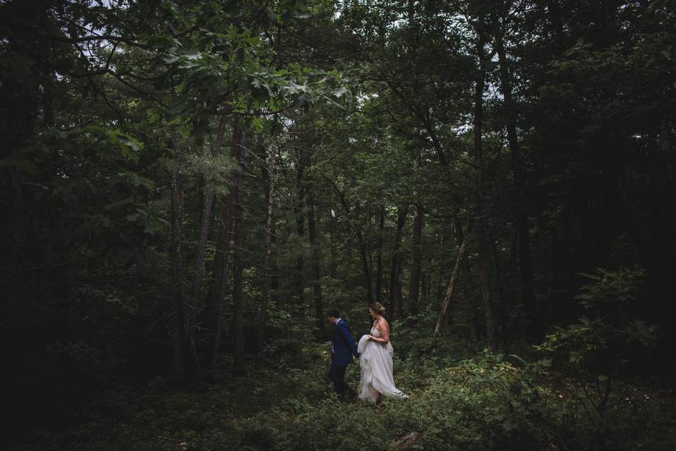 Bride & groom in forest