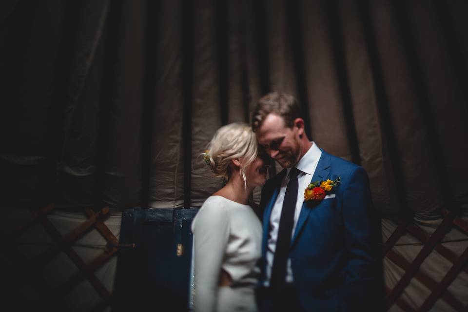 Bride & groom in yurt