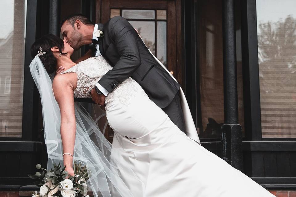 Bride & groom kiss