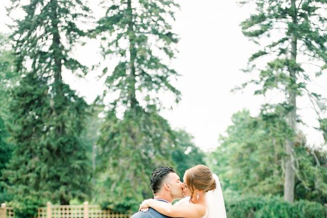 Bride and groom in rose garden