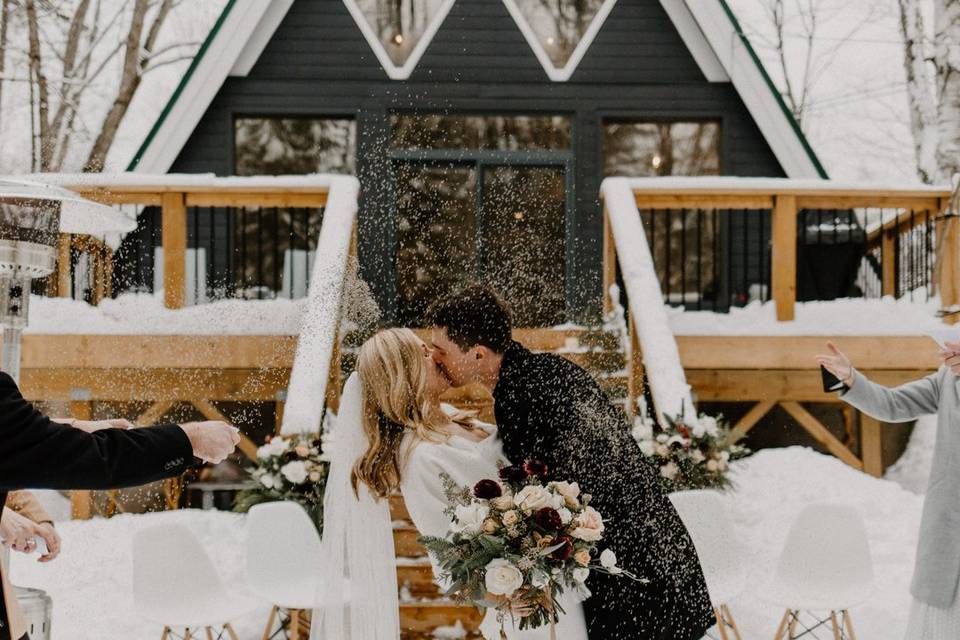 Bride and groom kiss