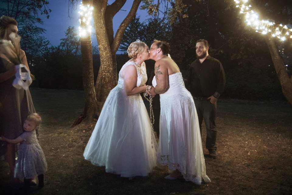 Brides Kissing