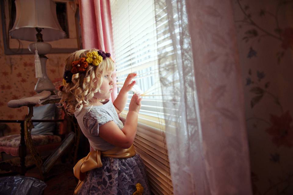 Girl Looking Out Window
