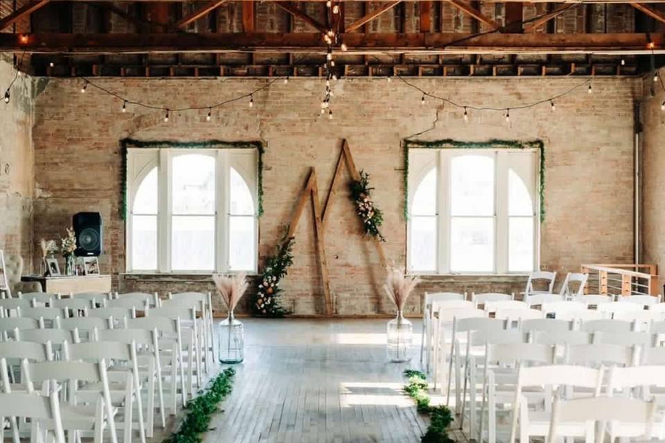 String lights, arch windows, and seating