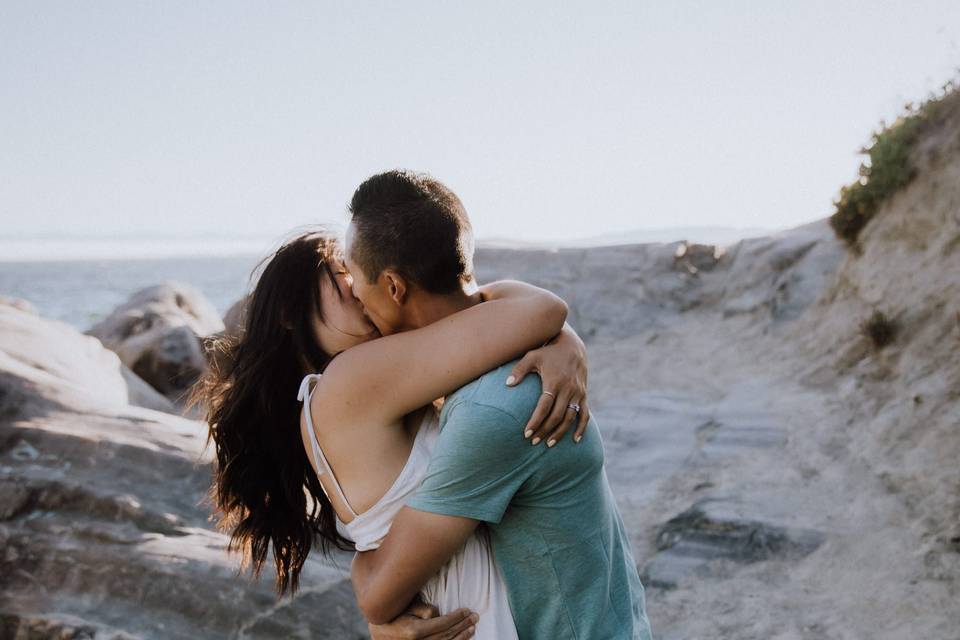 Couple kissing on beach