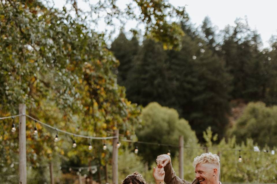 Couple dancing in field