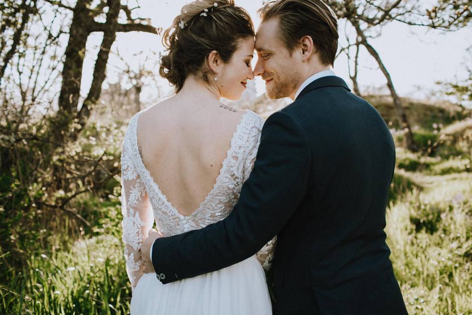 Married couple standing close