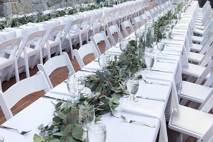 Table centerpiece with white roses