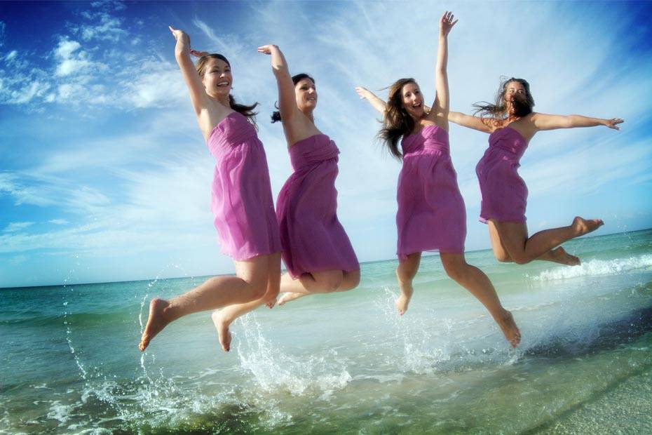 Bridesmaids Jumping  in Ocean
