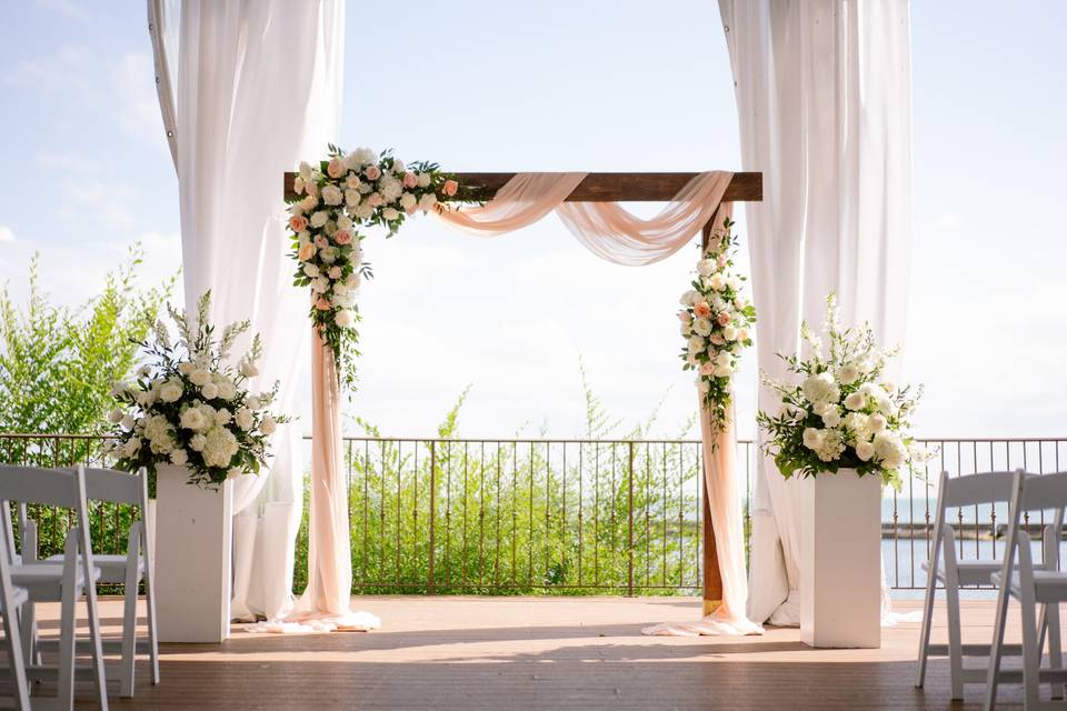 Ceremony arch and chair flower