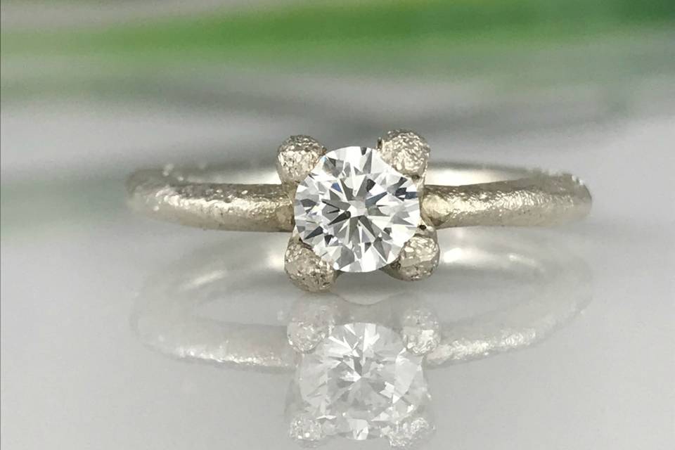 Claw set engagement ring