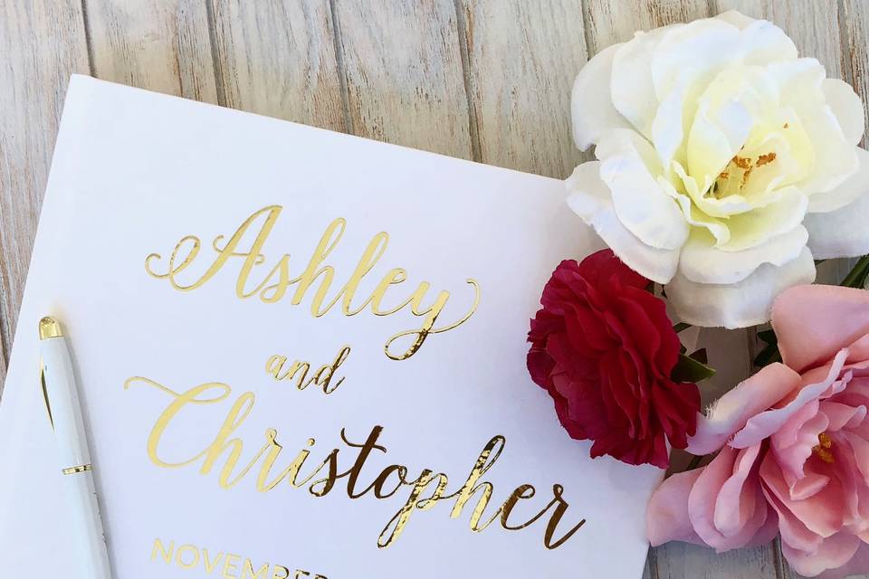 Wedding guestbook and flowers