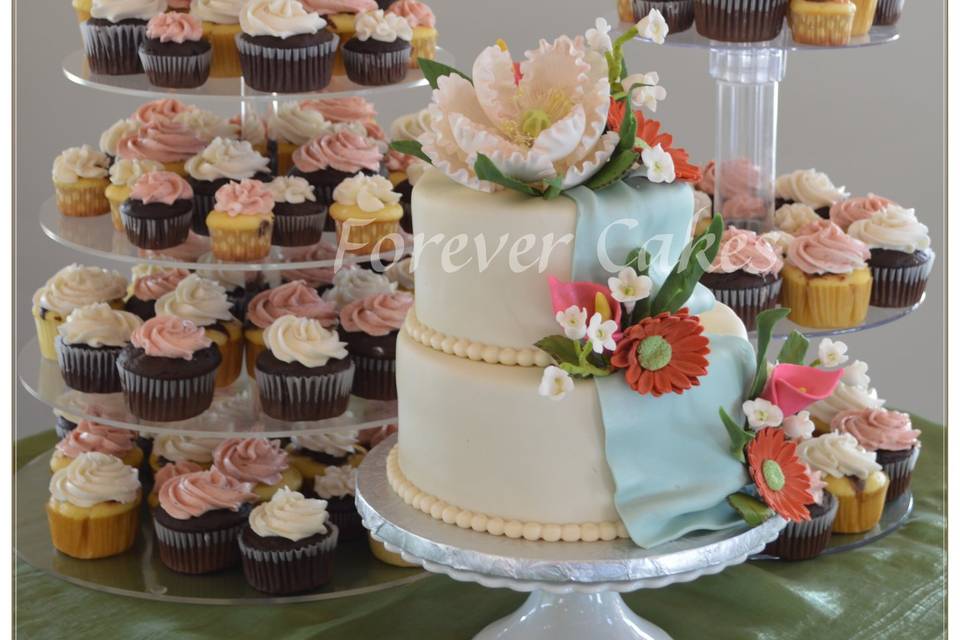 2 tiered flowers with cupcakes