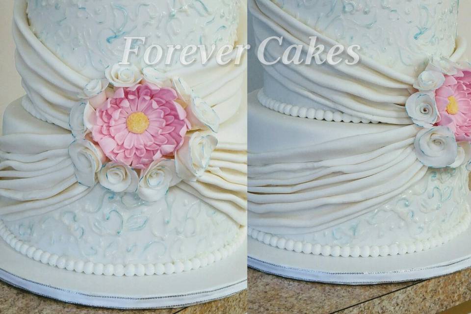 2 tiered flowers with cupcakes