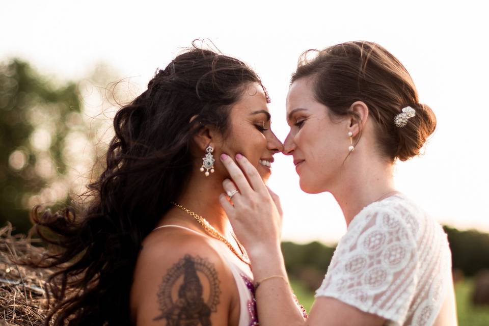 Two brides in an open field