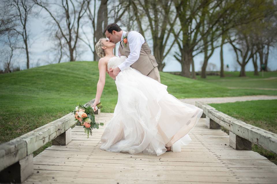 Groom dipping the bride