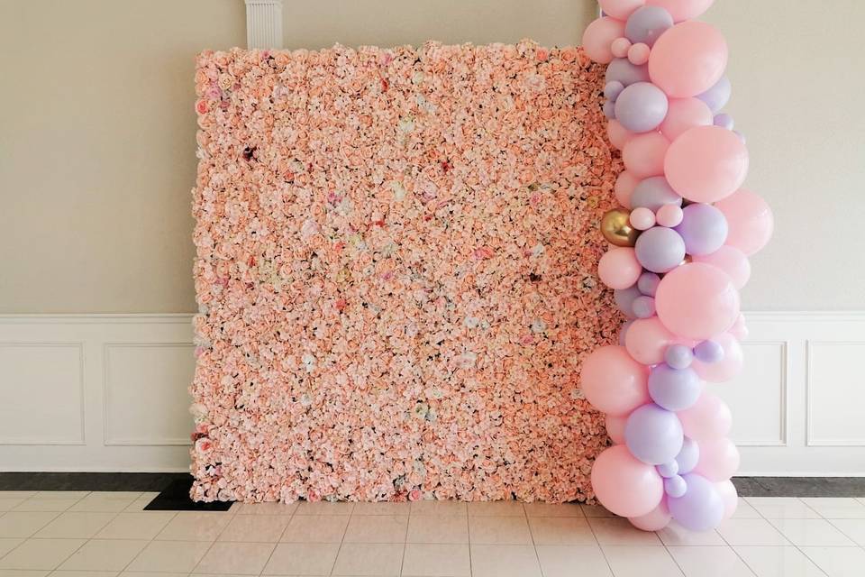 Half balloon arch with flower wall