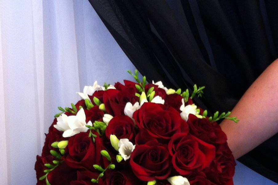 Red rose and freesia bouquet