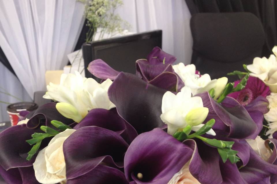 Calla rose and freesia bouquet