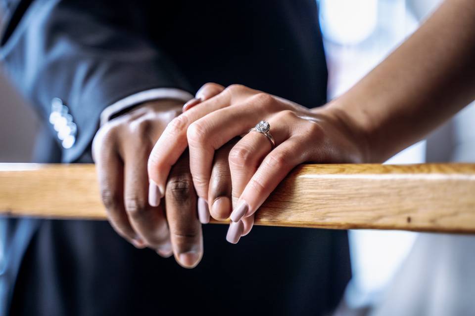 Bride and groom holding hands